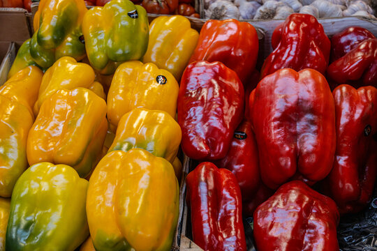 Yellow and red peppers (capsicums) on a market stall