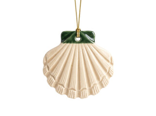 Ceramic seashell ornament with a green top hanging from a gold string against transparent background © Frodo