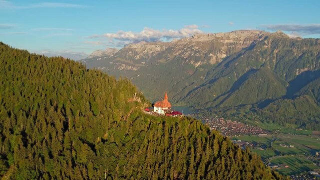 Aerial view of Interlaken and snow-capped Gletscherhorn from Harder Kulm at sunset, Switzerland