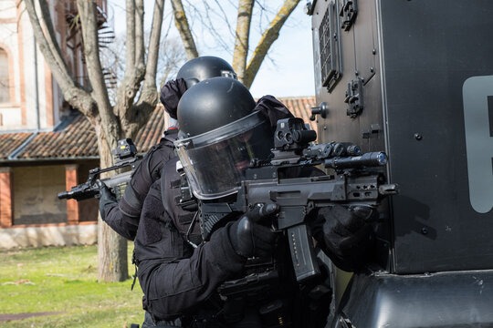 French police tactical unit officer working an angle with shield and weapon during a training drill in Toulouse, France