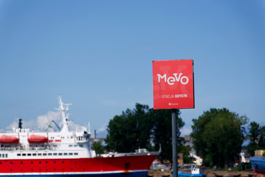Bike-sharing station for red MEVO shared bicycles and electric bikes manufactured by Segway, convenient and sustainable urban transportation on July 24, 2026 in Sopot, Poland.