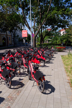 Bike-sharing station for red MEVO shared bicycles and electric bikes manufactured by Segway, convenient and sustainable urban transportation on July 24, 2026 in Sopot, Poland.