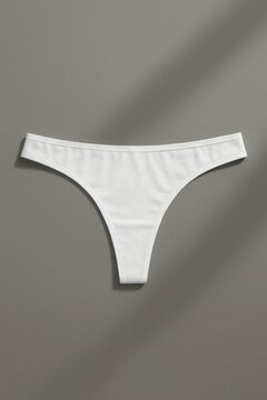 Minimalist white thong underwear.