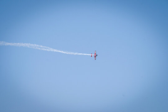 Aerobatic pass seen from the ground during the flying display of an aerospace trade fair at Le Bourget, Paris, France