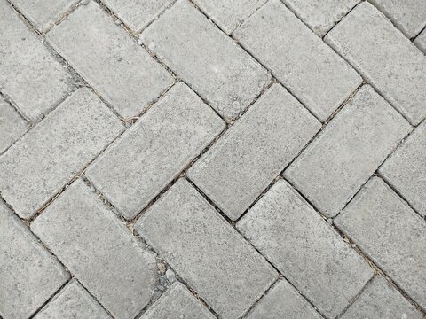 Close up of interlocking paving stones ground surface texture