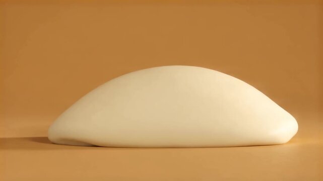 Cream clay ridge flattening into a smooth background