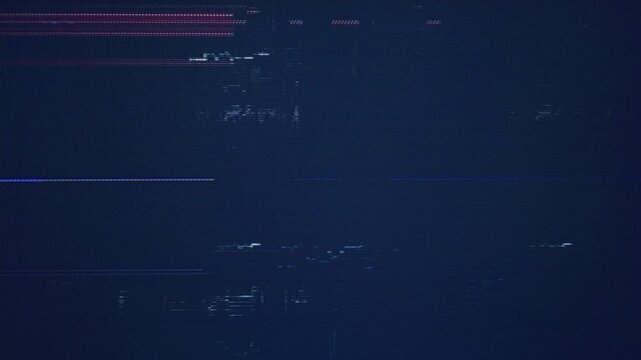 A close-up shot capturing colorful digital artifacts, data distortion, and scanline glitches from a retro game console on an old CRT TV screen.