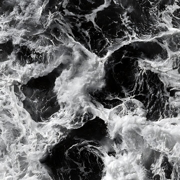 The sea water was churning into white foam