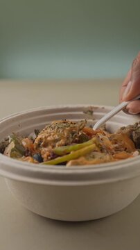 Nutritious Healthy Chicken Rice Bowl with Grilled Chicken, Steamed Rice and Fresh Vegetables, Overhead Close-Up Food Shot