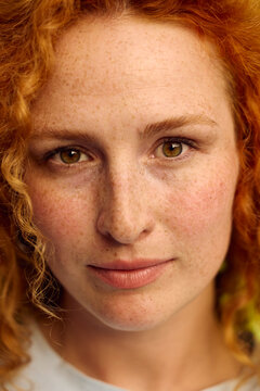 Portrait of a beautiful woman with freckles