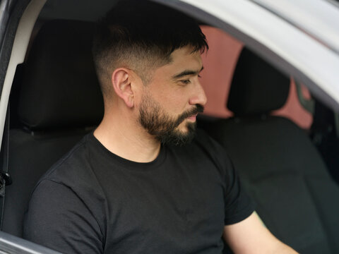 Man Sitting in a Car