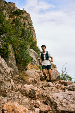 Trail Runner Descending Rocky Mountain