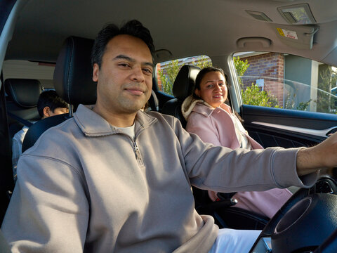 Family Enjoys Time Together in Car