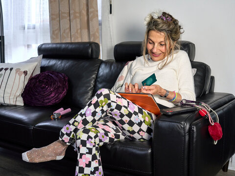 Senior Woman Enjoying Some Online Shopping Time at Home