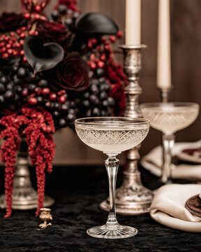 Luxury Dark Romantic Wedding Tablescape with Burgundy Flowers and Black Calla Lilies