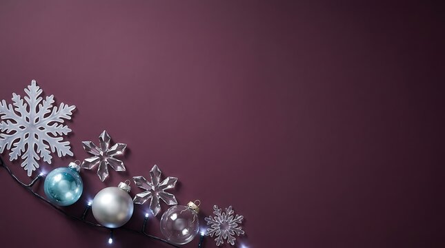 Christmas ornaments and snowflake decorations on a dark purple