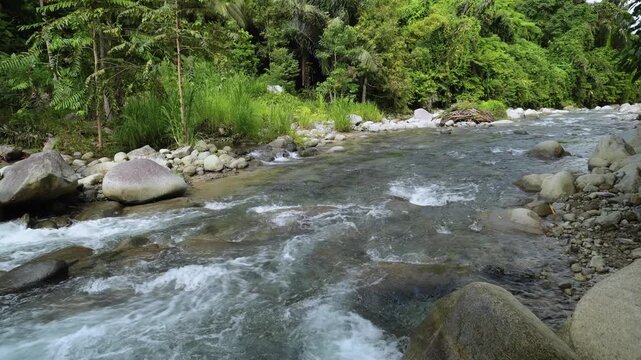 Fast Flowing Tropical River Through Rocky Landscape