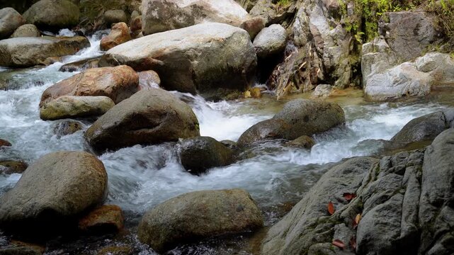 White Water Rapids Flowing Through Rocky River
