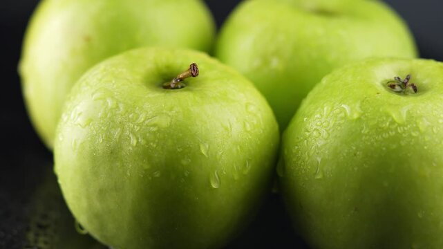 Fresh Green Apples with Water Droplets CloseUp video.
