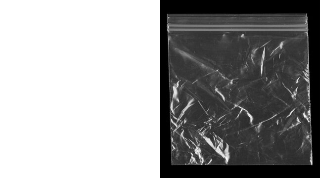 Transparent plastic zip bag with crumpled texture on black background, wrinkled polyethylene storage pouch, clear ziplock baggie for packaging design