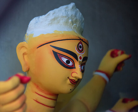 Unfinished idol of Hindu Goddess Durga with use of selective focus