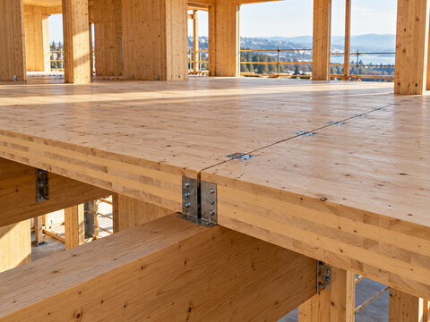 Mass timber floor connection with exposed glulam and CLT structure