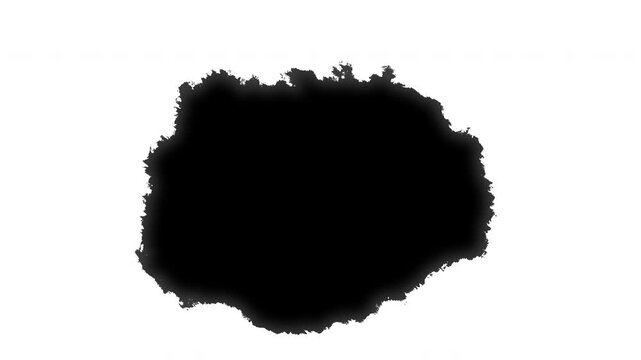 A transition featuring black paint splashes spreading across a white background, as well as white ink on a black background; the ink expands to fill the screen, flowing and radiating outwards.