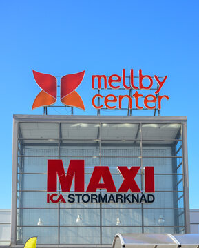 Mellbystrand, Sweden - August 06 2026: Mellby Center shopping complex with ICA Maxi supermarket entrance.