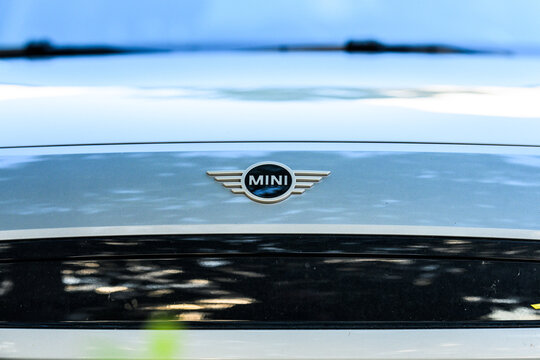Gothenburg, Sweden - August 21 2026: Silver MINI Cooper S front emblem and hood detail.