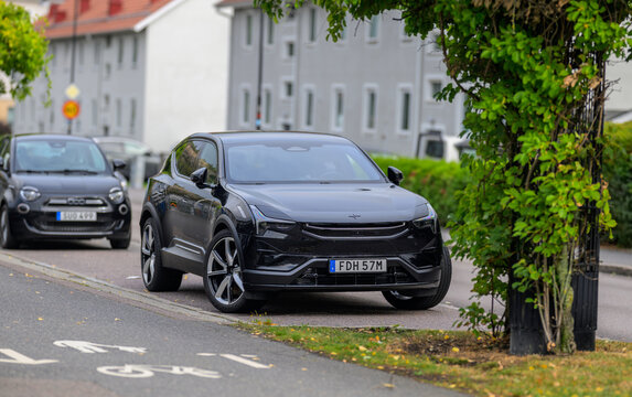 Gothenburg, Sweden - August 29 2026: Black Polestar 3 electric SUV parked on Swedish residential street.