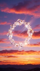 Fototapeta premium Surreal crystal ring floats in vibrant sunset sky. Transparent diamond shape glows against colorful clouds, orange horizon. Dreamy fantasy landscape with mystical light, magic atmosphere. Abstract