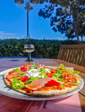Pizza bab&ograve;ne de Corse et son vetre de vin ros&eacute;