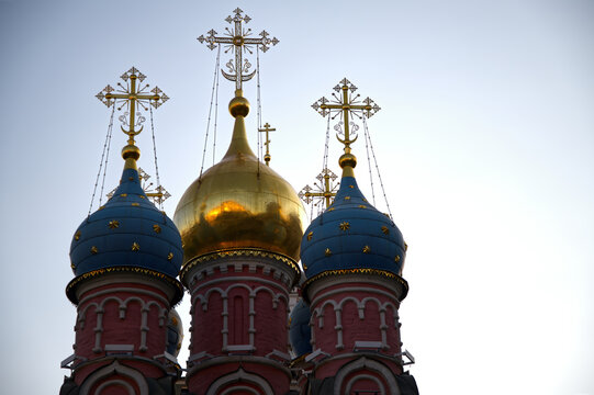 Detail of colorful onion domes and golden crosses of Russian Orthodox Church