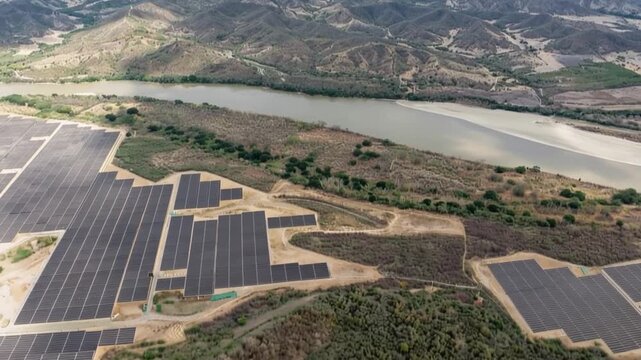 Puerta de Oro Large Scale Solar Photovoltaic Park beside the Magdalena River in Colombia. Time Lapse. Establishing Shot. Aerial View.