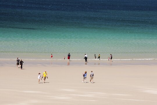 Tourists at White Sands Beach, Sennen, Cornwall, England, United Kingdom