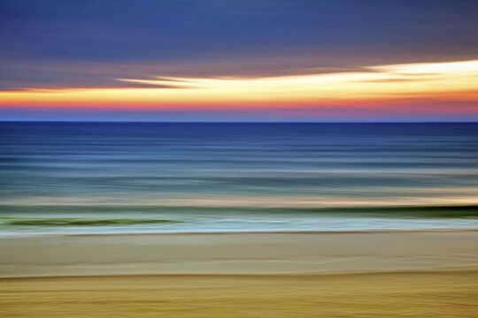 Gentle waves on the beach, evening mood on the North Sea, blur effect, Schleswig-Holstein, Germany