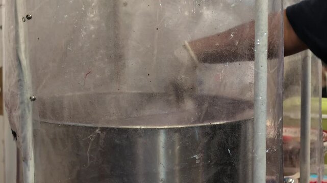 Making Fluffy Cotton Candy in Spinning Machine at Street Stall
