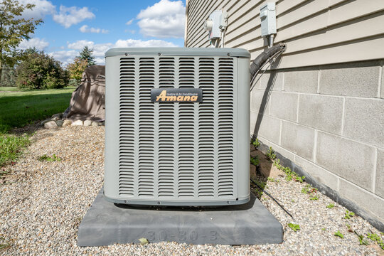 Detroit, Michigan - USA &ndash; October 4th 2026- Air conditioner condensing unit and compressor have been repaired by a certified HVAC technician