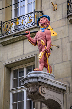 Historic Affe monkey guild statue with an axe on Kramgasse in Bern, Switzerland