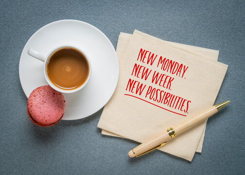 New Monday. New week. New possibilities. Inspirational motivational quote on a napkin with a cup of coffee. Concept of Monday motivation, fresh beginnings, positive thinking, and new opportunities.