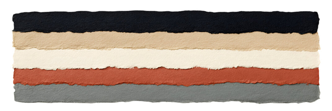 Stacked torn paper sheets with textured edges on black background