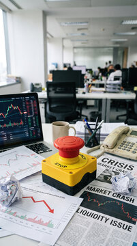 Emergency stop button financial chart office desk market crisis