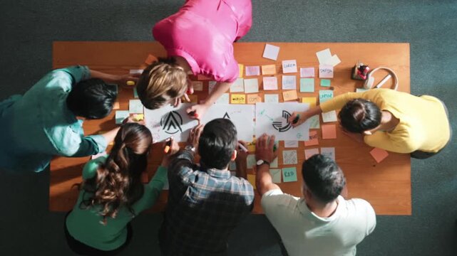 Time lapse of skilled businessman hand choosing color palettes while designing logo graphic. Aerial view of smart interior designer design and select color theme by using color palettes. Symposium.