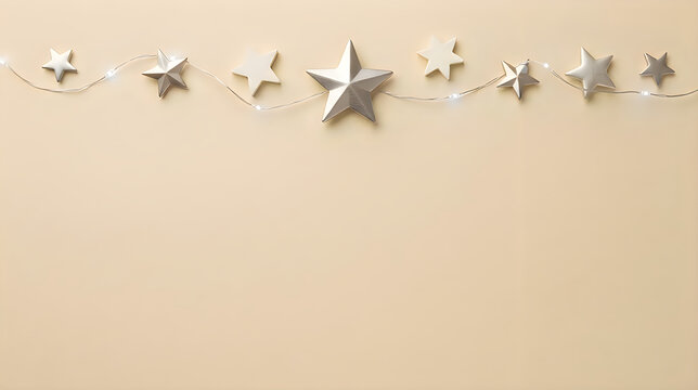 Silver star string lights on beige wall  christmas and happy new year background 