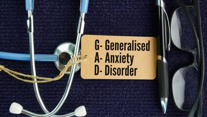Stethoscope and paper tag with the words Generalized anxiety disorder GAD is a mental health condition marked by excessive, uncontrollable, and persistent worry about everyday events and activities th © Fauzi