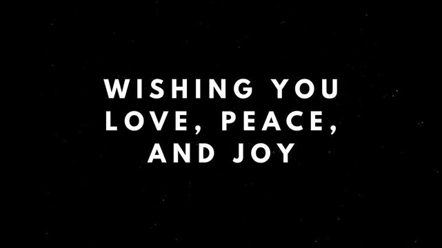Festive Holiday Greeting with "Wishing You Love, Peace, and Joy" Text on Dark Background, Ideal for Seasonal Promotions and Cards