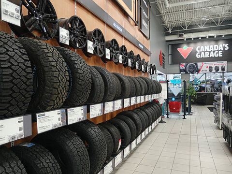 Penticton, Canada - July 19, 2026: Interior view of various tires and alloy wheels at a Canadian Tire store located in Penticton, British Columbia, Canada.