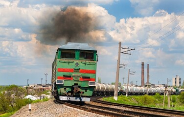 Freight train hauled by a diesel locomotive in Popasna, Luhansk oblast, Ukrainian railways © Leonid Andronov
