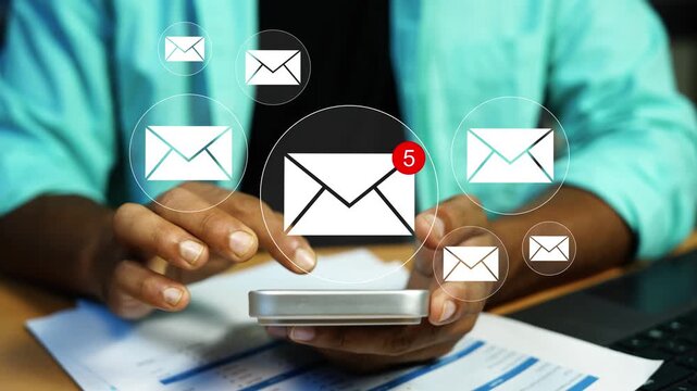 Holographic email notifications animation on smartphone, Close-up of a person using a smartphone with floating hologram email envelope icons, online messaging, inbox alerts and business communication.