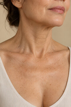 Mature neck and chest with fine lines and natural skin texture